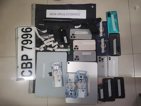 Police recovered the following items at the kidnapping crime scene: One Taurus 9mm pistol with one magazine loaded with four live rounds, one C2 P-07 9mm caliber pistol with a magazine loaded with seven live rounds, one North American Ans Black Widow 22 Magnum revolver, various ammunition including seven 9mm rounds and one 12 gauge round, ₱236,000.00 in cash, several electronic devices including an Apple iPad, Apple MacBook Air, and seven iPhones, one Chinese passport (alias Liu), one Vietnamese passport (Dong), a set of LTO Vehicle License Plates (CBP7996), one Matte Black Ford Ranger Sport, 76 suspected ecstasy tablets with an estimated value of ₱129,200.00, and more or less 5 grams of suspected shabu valued at ₱34,000.00.