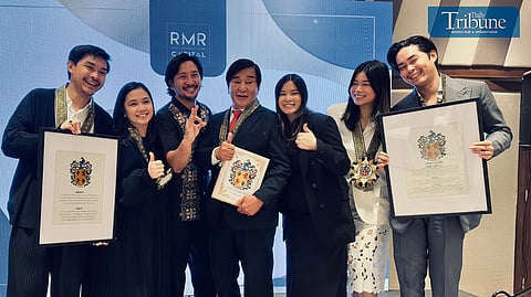 Nathaniel "Nikki" Romero (third from left) with relatives