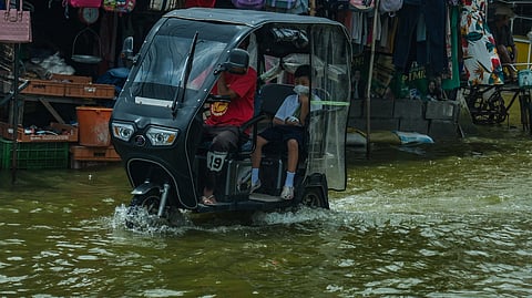(FILES) Residents of Masantol, Pampanga have adapted to frequent flooding caused by altered waterways, fishponds that impede water flow, and land subsidence exacerbated by volcanic lahars from Mount Pinatubo.