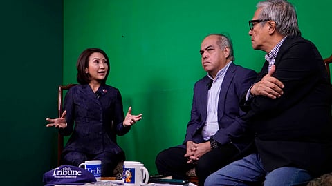 TOURISM Secretary Christina Garcia Frasco (left) explains a point to DAILY TRIBUNE Executive Editor Chito Lozada and Associate Business Editor Teddy Montelibano during her Straight Talk interview Wednesday.