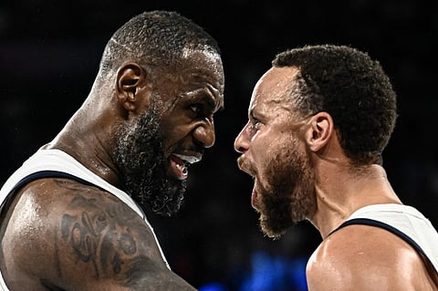 LEBRON James (left) and Stephen Curry celebrate after completing a 95-91 win over Serbia to advance to the gold medal match of the men’s basketball event of the Paris Olympics.