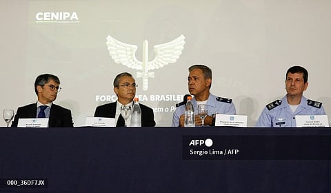 (L to R) Ricardo Catanant and Luiz Ricardo Nascimento, directors of the Brazilian National Civil Aviation Agency (ANAC); Air Brigadier Marcelo Moreno of the Brazilian Air Force and head of the Air Accident Investigation and Prevention Center (CENIPA); and the chief of CENIPA, Colonel Carlos Henrique Baldin, participate in a press conference about the plane that crashed in Vinhedo, Sao Paulo State, killing 61 people, in Brasilia on August 9, 2024. An airplane carrying 57 passengers and four crew crashed on August 9 in Brazil's Sao Paulo state, killing everyone on board, local officials said. The aircraft, a French-made ATR 72-500 operated by the airline Voepass, was travelling from Cascavel in southern Parana state to Sao Paulo's Guarulhos international airport when it crashed in the city of Vinhedo.