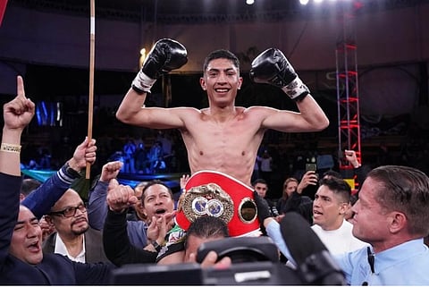 Angel Ayala celebrates his sixth-round knockout win over Filipino Dave ‘Doberman’ Apolinario in their clash for the vacant IBF flyweight belt Friday night (Saturday morning in Manila) in Mexico City.