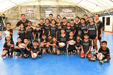 Kids aged 13 and under take part in a recent clinic conducted by Filipino-British star Marcus Smith in Payatas, Quezon City.