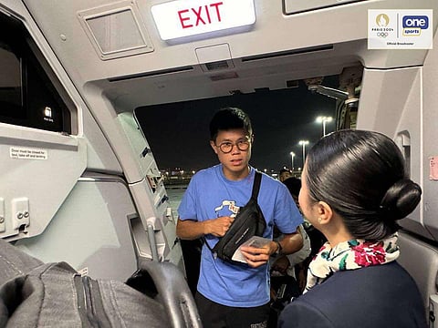 ERNEST John Obiena joins other members of Team Philippines in the chartered flight back to Manila following a historic participation in the Paris Olympics.