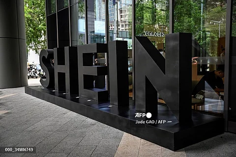 This photo taken on 11 June, 2024 shows the logo of fast fashion e-commerce company Shein outside its office in Guangzhou in southern China's Guangdong province.