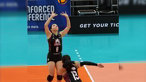 Michelle Cobb (left) sets up Celine Domingo for the winning spike as Akari turned back Nxled, 21-25, 25-19, 25-17, 25-18 in their PVL Reinforced Conference game on Thursday at the Philsports Arena in Pasig.