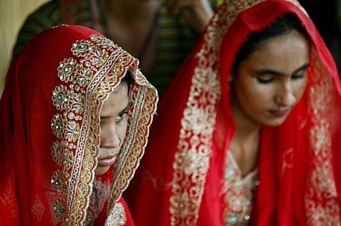 Shamila (L) was married off in exchange for money, one of a growing number of underage marriages taking place in Pakistan's flood-stricken areas