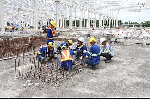 SHERA’s Mabalacat plant staff hard at work as the plant reaches 60 percent completion.