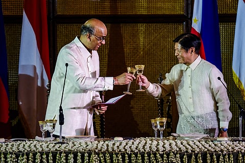 President Ferdinand R. Marcos Jr. offers a toast to Singaporean President Tharman Shanmugaratnam during the state banquet at the ceremonial hall of the Malacanang Palace on Thursday, 15 August.
