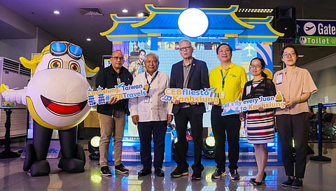 LOOK: Photo from CEB (L-R): MIAA head executive assistant Atty. Chris Bendijo, Transport Secretary Jaime Bautista, Civil Aeronautics Board Executive Director Atty. Carmelo Arcilla, CEB Chief Corporate Affairs Officer Michael Ivan Shau, and TECO representatives Ms. Sophia Chi and Ms. Donna Hung pose for a photo during the inaugural flight event for CEB's Manila-Kaohsiung route.