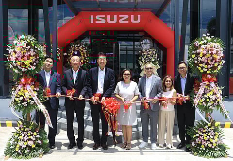 GRACING the event are (from left) IPC vice president for sales Toshihiko Kojima, IPC executive VP Shojiro Sakoda, IPC president Tetsuya Fujita, BMD group executive VP Dr. Zinnia Domingo-Perez, BMD group VP for human resource/Isuzu Cabanatuan branch manager Benito Domingo Jr., BMD group treasurer Ma. Rizalina Domingo-Mijares, BMD group VP for sales and marketing Karlo Domingo.