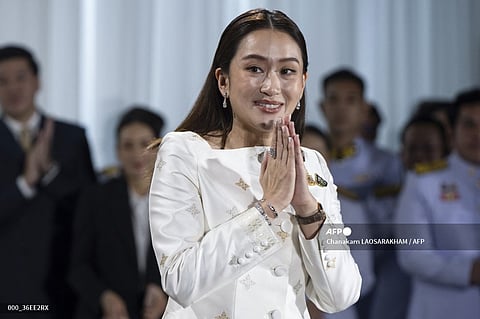 Thai Prime Minister Paetongtarn Shinawatra, known by her nickname "Ung Ing" and daughter of former prime minister Thaksin Shinawatra, gestures during a press conference after the royal endorsement ceremony appointing her as the new Prime Minister of Thailand, in Bangkok on August 18, 2024.
Chanakarn LAOSARAKHAM / AFP
