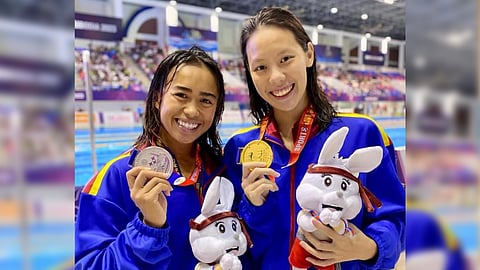 XIANDI Chua (right) outduels her fellow national team member, Chloe Isleta, by a slim margin in the women’s 200-meter individual medley event of the PAI 25-meter short course national trials.
