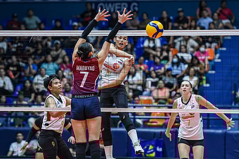 Majoy Baron of PLDT eludes the defense Maddie Madayag of Choco Mucho during their PVL Reinforced Conference game last Thursday at the Filoil EcoOil Center. The High Speed Hitters won, 21-25, 25-18, 25-16, 25-19.