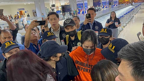 CASSANDRA Li Ong and Sheila Guo are flanked by immigration personnel upon their arrival at the Ninoy Aquino International Airport from Jakarta.