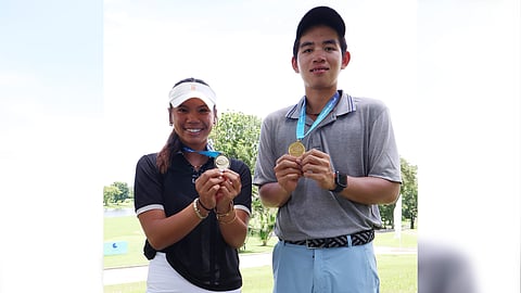 WINNERS at last, Lia Duque and Mark Kobayashi cherish their medals.