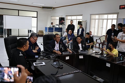 Seeking answers Department of Justice spokesperson Mico Clavano (right) in a press briefing yesterday ahead of the inquest proceedings for Sheila Guo and Cassandra Ong. With Clavano were NBI chief Jaime Santiago and BI officials.