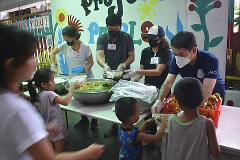 TONDO children get free dental service and meals from Project Pearls and its donors and volunteers.