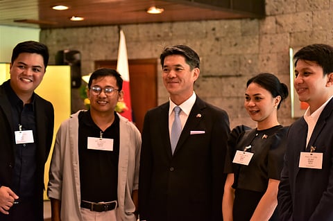 JAPANESE Ambassador to the Philippines Endo Kazuya (center) chats with some of the MEXT scholars during the send-off ceremony.