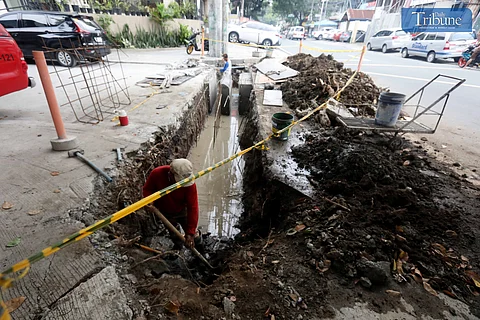 LOOK: Workers are seen digging along Judge Jimenez St. in Brgy. Kamuning, Quezon City, for a flood mitigation project on Monday, 26 August 2024.
