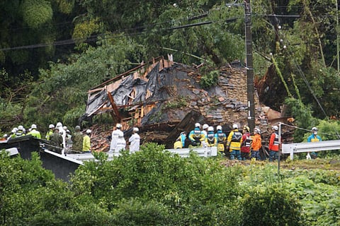 STRONG SHANSHAN. This photo shows rescue workers outside a house hit by a landslide in Gamagori, Aichi prefecture on Wednesday. Four members of the same family were missing in Japan after heavy rain from approaching typhoon Shanshan triggered a landslide, authorities said. Japan Airlines canceled 172 domestic flights and six international flights scheduled for Wednesday and Thursday, while ANA nixed 219 domestic flights and four international ones on Wednesday, Thursday and Friday.