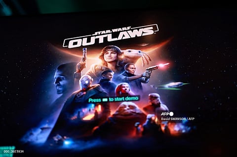 (FILES) A screen displays a demo of Star Wars Outlaws at Ubisoft's Forward conference at The Belasco in Los Angeles, California, on 9 June 2024.