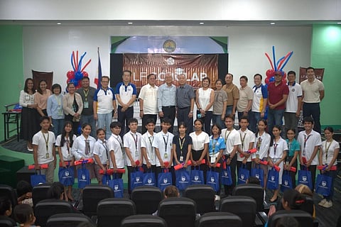 Brothers Gregorio L. Uy and Samuel L. Uy (top center), founders of the Gregorio P. Uy & Lee Peng Scholarship Foundation, and the 2024 scholars during the awarding ceremony held at the Isabela State University Cauayan Campus.