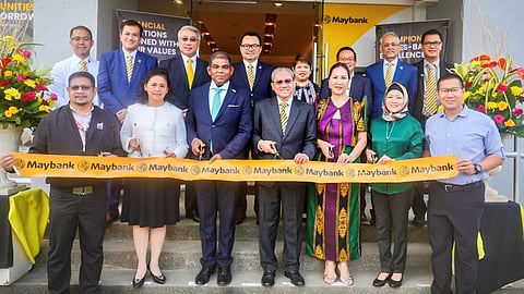 Key bank stakeholders lead the ribbon-cutting ceremony for Maybank’s Zamboanga branch (from left) Al-Zamir Lipae, regional director for Region 9, Department of Trade and Industry; Judith E. Sungsai, managing director, financial supervision sub-sector 1, Bangko Sentral ng Pilipinas; Dato Abdul Malik Melvin Castelino, Ambassador of Malaysia to the Philippines; Nor Shahrizan Sulaiman, deputy CEO, Maybank Islamic Berhad; Abigail Tina M. Del Rosario, country director and president and CEO, Maybank Philippines; Sitti Djalia Turabin-Hataman, mayor of Isabela, Basilan; and Bryan Go of BG Investment and Development Corp.