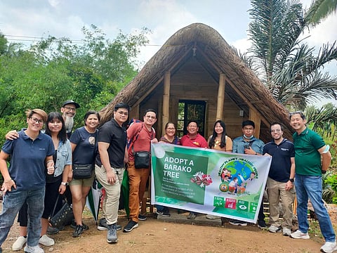 DOCTORS from the Department of Community and Family Medicine of Far Eastern University-Nicanor Reyes Medical Foundation pose with George Salinas (5th from right) after joining NKBIF’s Adopt-a-Barako Tree Program.