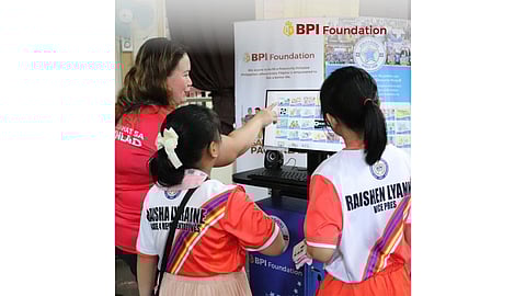 STARBOOKS is demonstrated by a volunteer to young students.