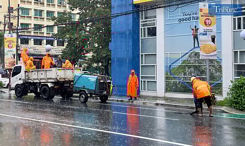 TRIBUNE-dpwh-men-at-work