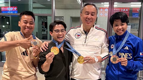 Philippine Olympic Committee president Abraham ‘Bambol’ Tolentino (second from right) rewards Paris Olympics medalists Carlos Yulo (second from left), Aira Villegas (right) and Nesthy Petecio with houses and lots in Tagaytay City.