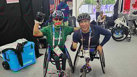 JERROLD Mangliwan (right) poses with Salvador Hernandez Mondragon of Mexico ahead of his men’s 100-meter T52 event of the Paris Paralympics.