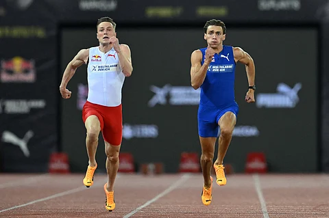 Armand Duplantis (right) outsprints Karsten Warholm in a friendly 100m race ahead of the Zurich leg of the Diamond League.