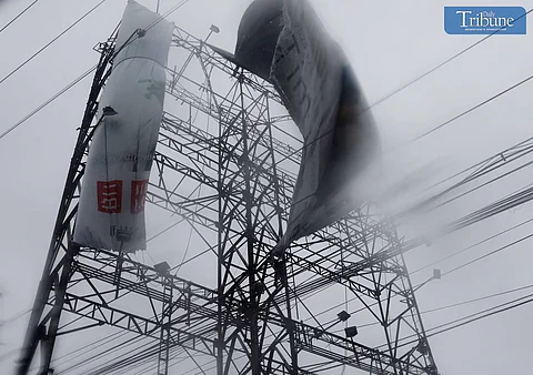 On Monday, 2 September 2024, workers battled heavy rain and wind from Tropical Storm "Enteng" while trying to fold a billboard on EDSA, Brgy Kamuning in Quezon City.