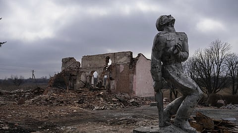 File photo of a Soviet-era World War II monument near a destroyed cultural centre near Avdiivka, in Ukraine's Donetsk region taken on March 21, 2024.