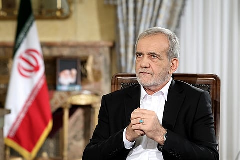 A handout picture provided by the Iranian Presidency shows Iran's President Masoud Pezeshkian speaking during a televised interview in the capital of Tehran on 31 August, 2024.