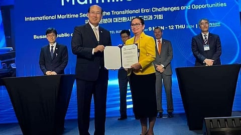 MARINA Administrator Sonia Malaluan receives her certificate of assignment as vice chair of the International Forum on Education and Training for Advanced Seafarers on High-Tech Maritime Mobility from International Maritime Organization secretary-general Kitack Lim at the inaugural 2024 International Maritime Mobility Forum on 10 September 2024 in Busan, South Korea.