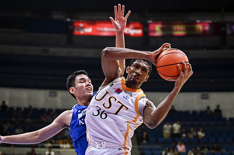Malian Mo Tounkara puts up a double-double to lead UST to a 74-64 win over Ateneo in the UAAP Season 87 men's basketball tournament.