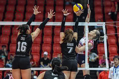 JEMA Galanza of Creamline soars high to challenge the defense of Farm Fresh during their match in the PVL Invitational Conference. The Cool Smashers won, 25-15, 25-13, 25-19.