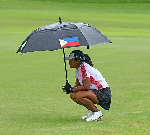 PRECIOUS Zaragosa keeps her focus despite the light drizzle in the final round of the girls 13-15 division of the JPGT Luzon Series 7 at Sherwood Hills Golf Club.