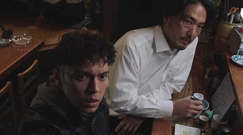 Carlo Aquino and Takehiro Hira in ‘Crosspoint.’