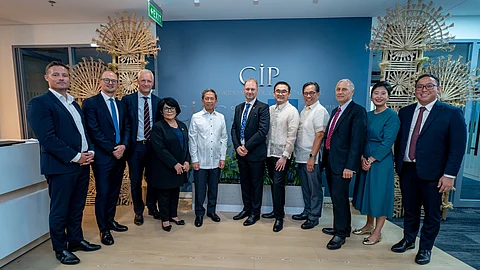 At the ribbon-cutting ceremony for the opening of Copenhagen Infrastructure Partners’ Manila office in ORE Building, BGC, Taguig City are (from left) Rune Damgaard, Co-CEO of Copenhagen Offshore Partners; Jesper Holst, Partner and Co-CEO of Copenhagen Offshore Partners; Robert Helms, Partner of Growth Market Fund, Copenhagen Infrastructure Partners; Maria Antonia Yulo-Loyzaga, Secretary of the Department of Environment and Natural Resources; Raphael P. M. Lotilla, Secretary of the Department of Energy; Przemek Lupa, Associate Partner and Head of Southeast Asia, Growth Market Fund, Copenhagen Infrastructure Partners; Secretary Frederick Go, Special Assistant to the President for Investment and Economic Affairs; Leo Herrera-Lim, Ambassador of the Philippines to Denmark; Franz-Michael Skjold Mellbin, Ambassador of Denmark to the Philippines; Marina Hsu, Regional Managing Director of Copenhagen Infrastructure Service Co.; and Francis Isagani Daba, Business Development Director of Copenhagen Infrastructure Service Company.