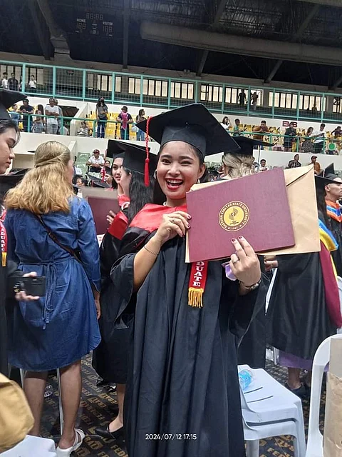 JENNIFER Caparoso during her graduation from the Eastern Visayas State University.