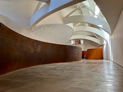 Guggenheim Bilbao’s Gallery 104, with an expansive view of ‘Snake’ (1994-1997) by Richard Serra.