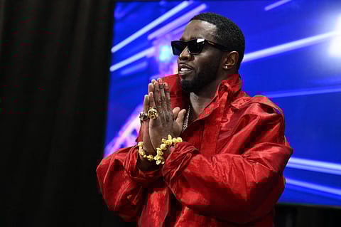 (FILES) US producer-musician Sean "Diddy" Combs gestures in the press room during the MTV Video Music Awards at the Prudential Center in Newark, New Jersey, on September 12, 2023. Combs -- the rap mogul whose star has plunged after a wave of sex trafficking and assault lawsuits against him -- was arrested in Manhattan late on 16 September, 2024, multiple US news outlets reported. The 54-year-old's arrest follows a grand jury indictment and the charges are not immediately clear, The New York Times said, citing a person familiar with the indictment.