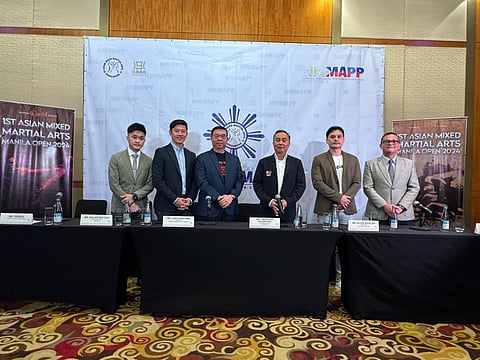 NASYONAL Mixed Martial Arts Pederasyon ng Pilipinas secretary general Alvin Aguilar (second from right) is determined to form the best team for the Asian Mixed Martial Arts Association Manila Cup in October. Also shown are (from left to right) Derris Wong of 9 Dynasty, Galastein Tan and Lock Wai Han of Asian Mixed Martial Arts Association, Philippine Olympic Committee president Abraham ‘Bambol’ Tolentino and Newport marketing officer David Jorden.