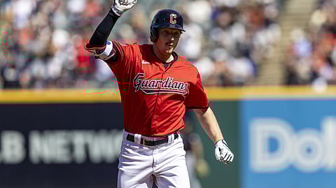 Cleveland's Kyle Manzardo celebrates a home run that helped the Guardians beat Minnesota to clinch a Major League Baseball playoff berth