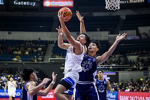 Shawn Tuano leads Ateneo in a 60-51 escape over Adamson to barge into the win column of the UAAP Season 87 men's basketball tournament.